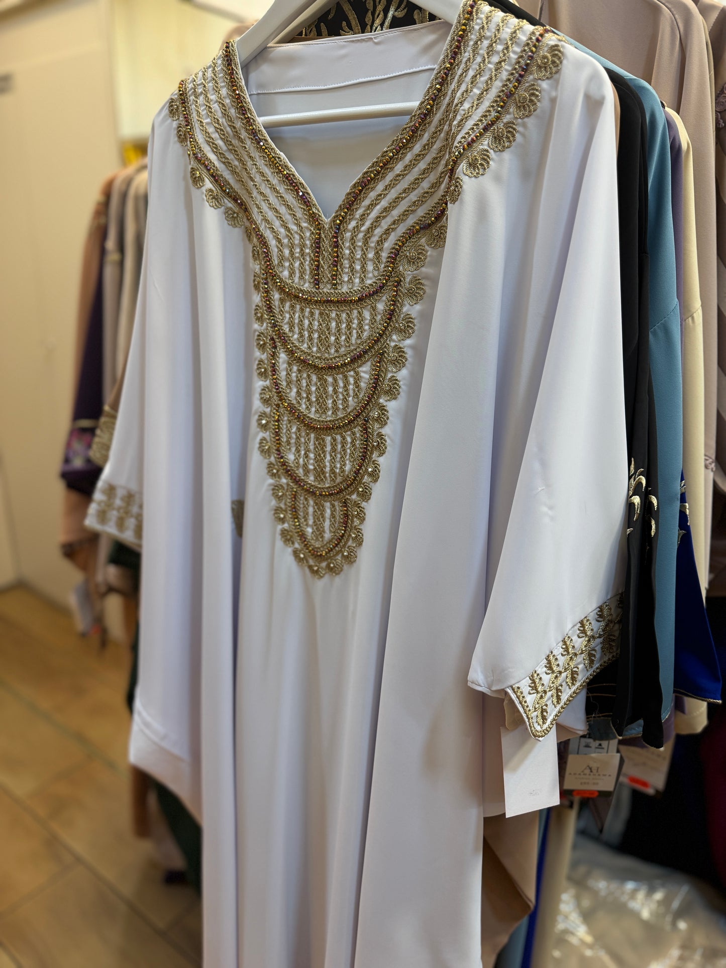 Moroccan kaftan detail fabric embroidery women